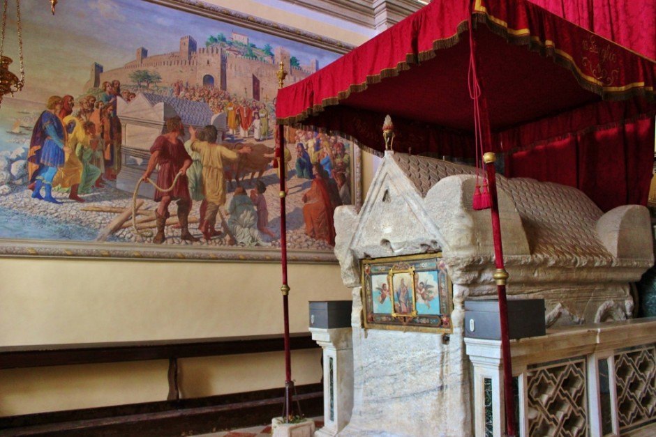 St. Euphemia's tomb and a painting depicting the story of how the tomb arrived in Rovinj, Croatia