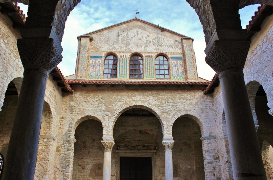 The Euphrasian Basilica facade has remains of mosaics, but the upper section is completely void of the artwork that was once there