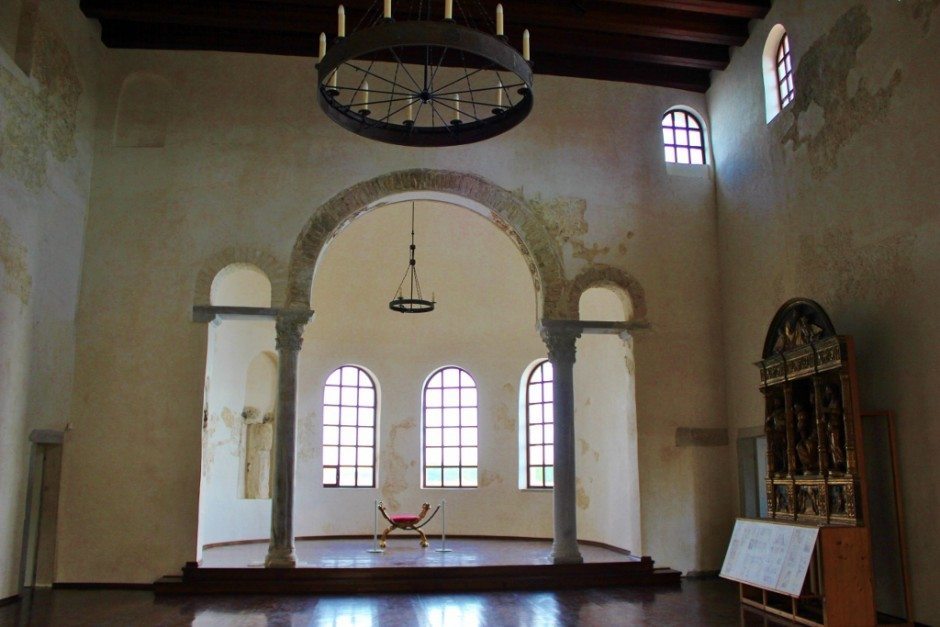 When we entered the Bishop's Palace (part of the Euphrasian Basilica in Porec, we noticed the solitary chair bathed in light and imagined walking in with the bishop sitting there