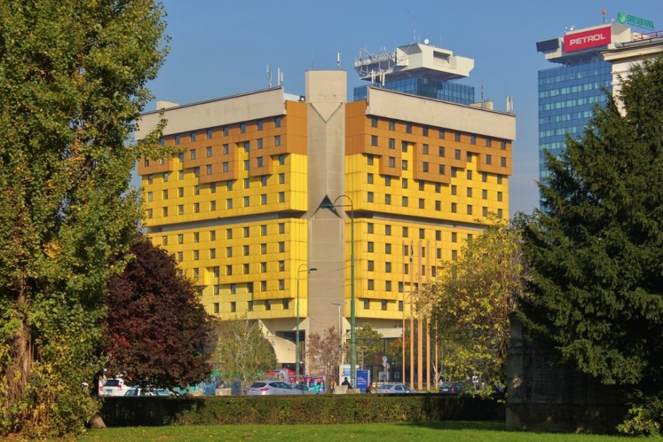 20 years after the Siege of Sarajevo the well-known Holiday Inn no longer bears the hotel chains name and the reception desk is dark and unmanned