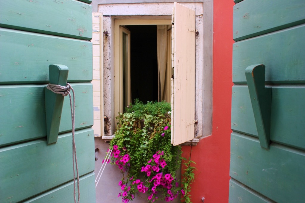 Using Airbnb in Rovinj, Croatia View out the wood-shutters