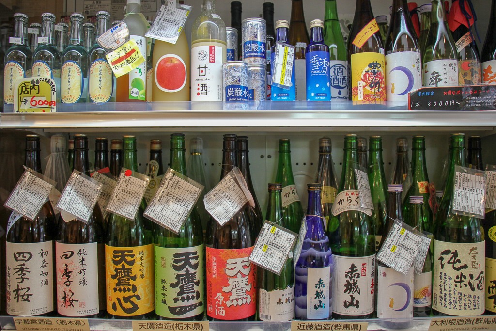 Bottles of chilled sake for sale at Meishu Center in Tokyo, Japan